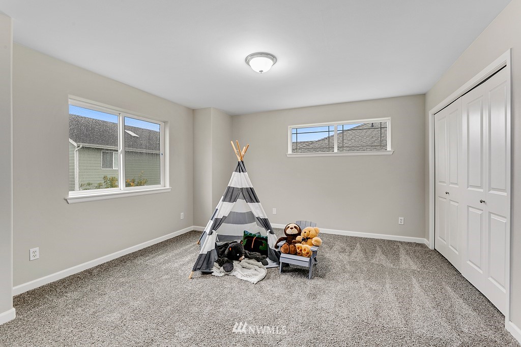2222 Smithers Avenue South Renton, WA 98055 - Photo 22 of 25 a view of a room with furniture and windows