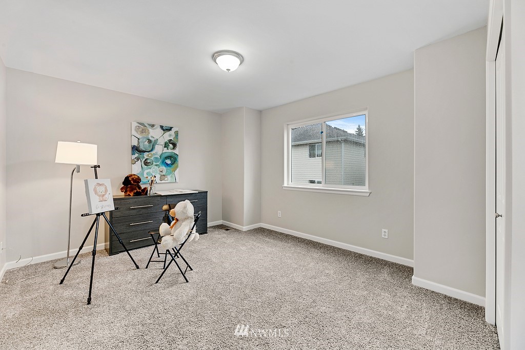 2222 Smithers Avenue South Renton, WA 98055 - Photo 23 of 25 a workspace with furniture and a wooden floor