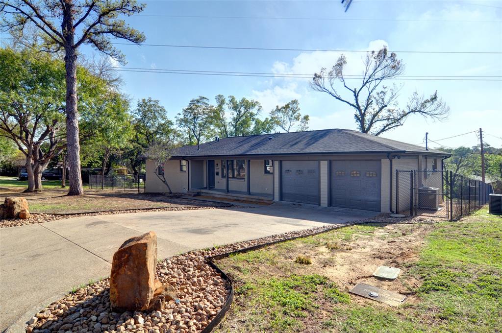 5549 Sam Calloway Road Fort Worth, TX 76114 - Photo 4 of 31 a house with trees in front of it