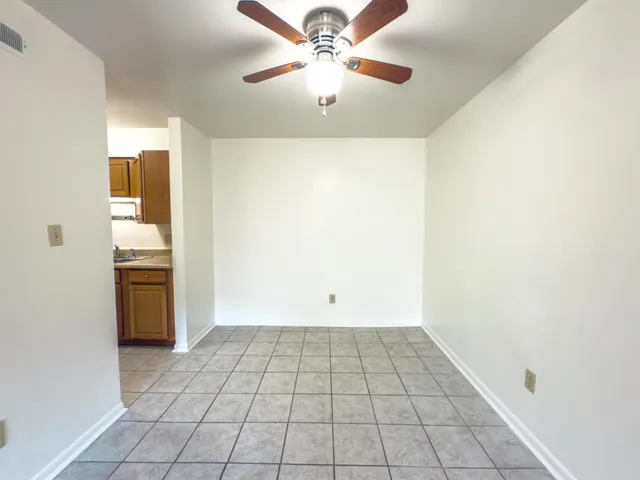 a view of an empty room and window