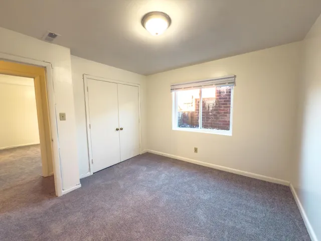 an empty room with a window