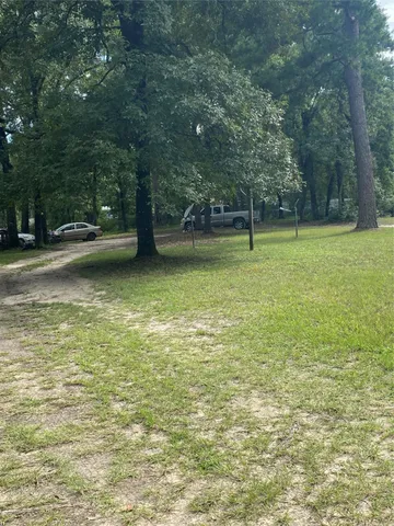 a view of a yard with a trees