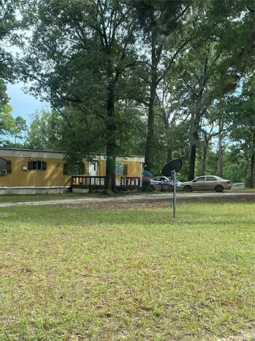 a view of a swimming pool with a bench