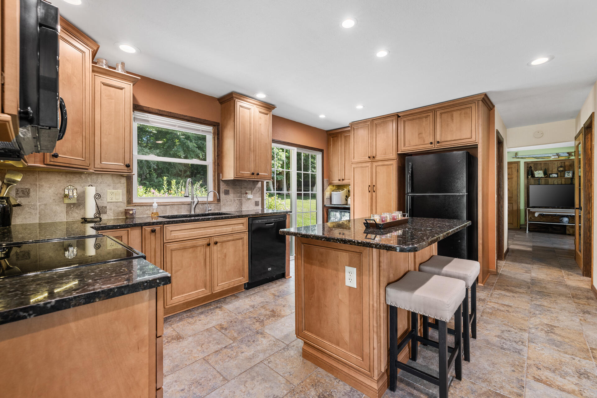 W250S4461 Center Road Waukesha, WI 53189 - Photo 15 of 36 Granite counter tops, includes appliances plus wine refrigerator
