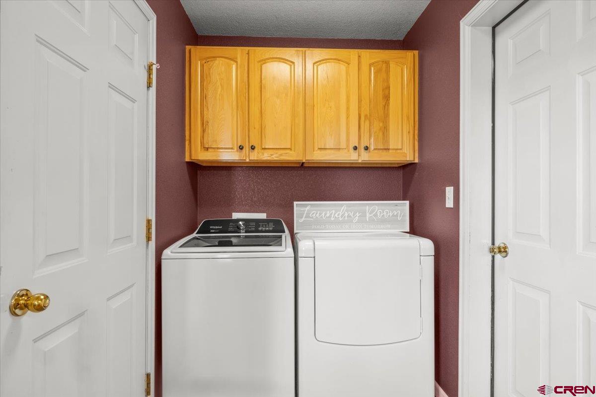 1600 Arland Road Montrose, CO 81401 - Photo 12 of 26 a utility room with dryer and washer