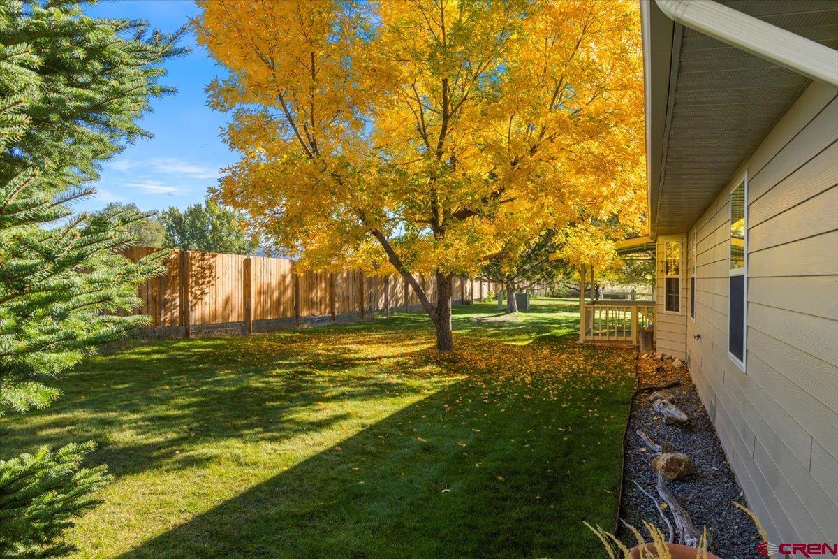 1600 Arland Road Montrose, CO 81401 - Photo 14 of 26 a view of a yard with an outdoor space