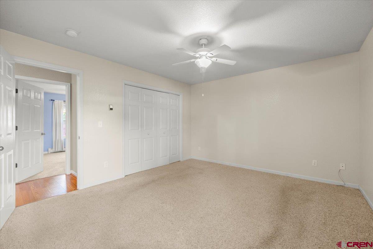 1600 Arland Road Montrose, CO 81401 - Photo 19 of 26 wooden floor in an empty room