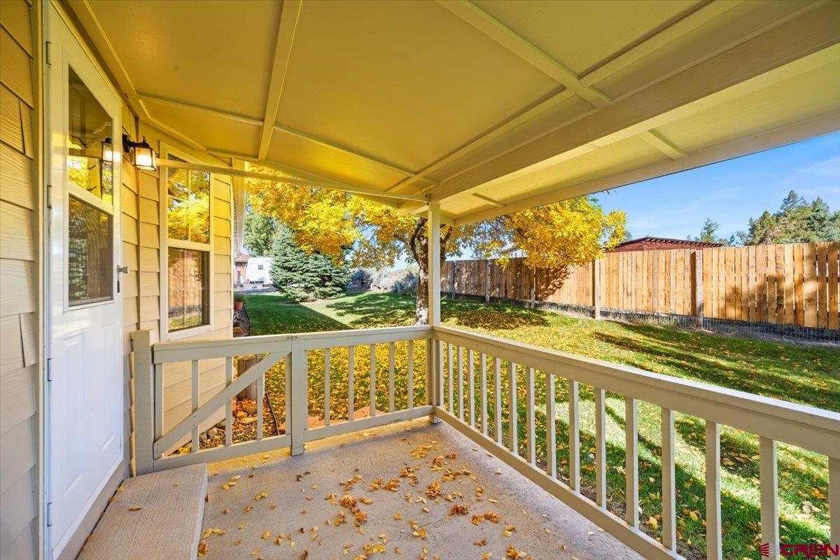 1600 Arland Road Montrose, CO 81401 - Photo 6 of 26 a view of a balcony with lake view