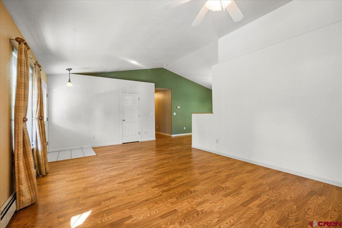 1600 Arland Road Montrose, CO 81401 - Photo 8 of 26 a view of an empty room with a window