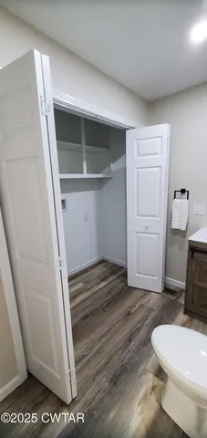 a bathroom with a sink and toilet