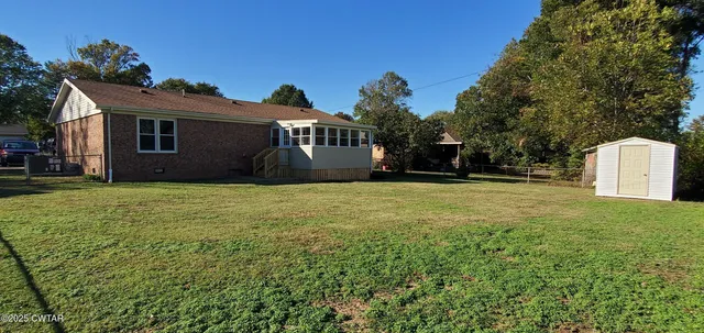 a house view with a garden