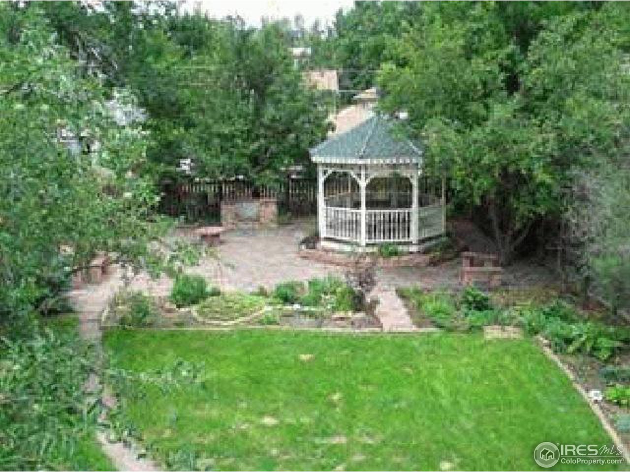 2021 Mapleton Avenue Boulder, CO 80304 - Photo 2 of 7 a front view of a house with a yard