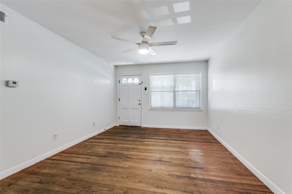10815 Ruth Ann Drive Dallas, TX 75228 - Photo 2 of 12 wooden floor in an empty room