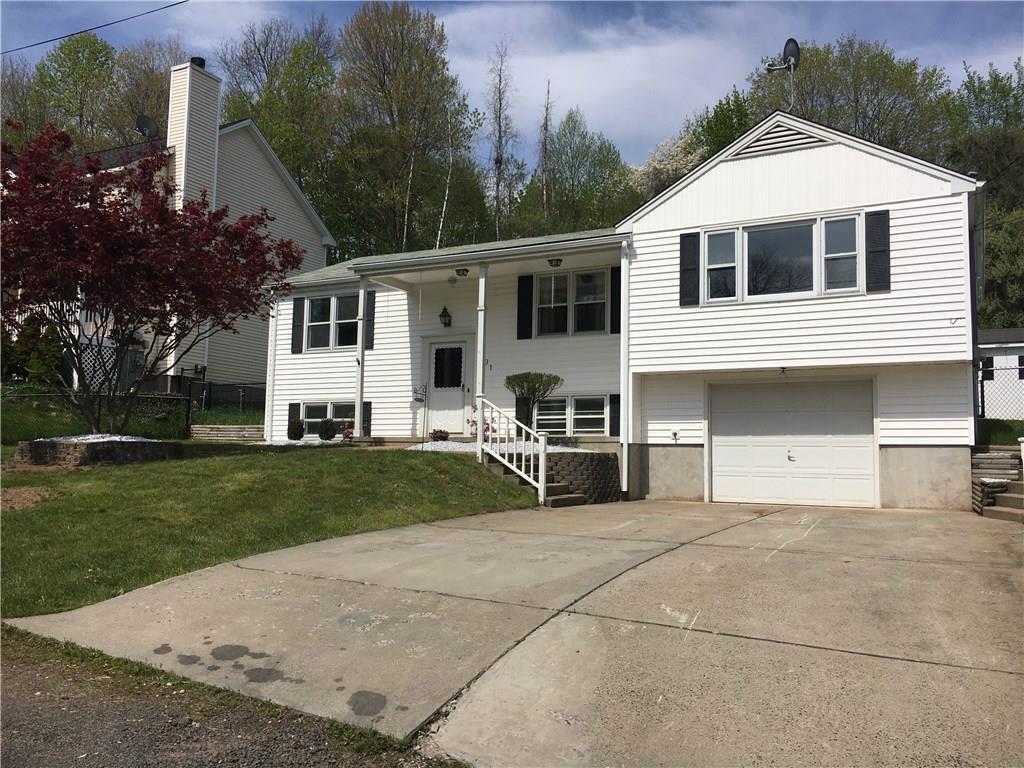 301 Old Stagecoach Road Meriden, CT 06450 - Photo 1 of 1 a view of a white house with a yard and large tree
