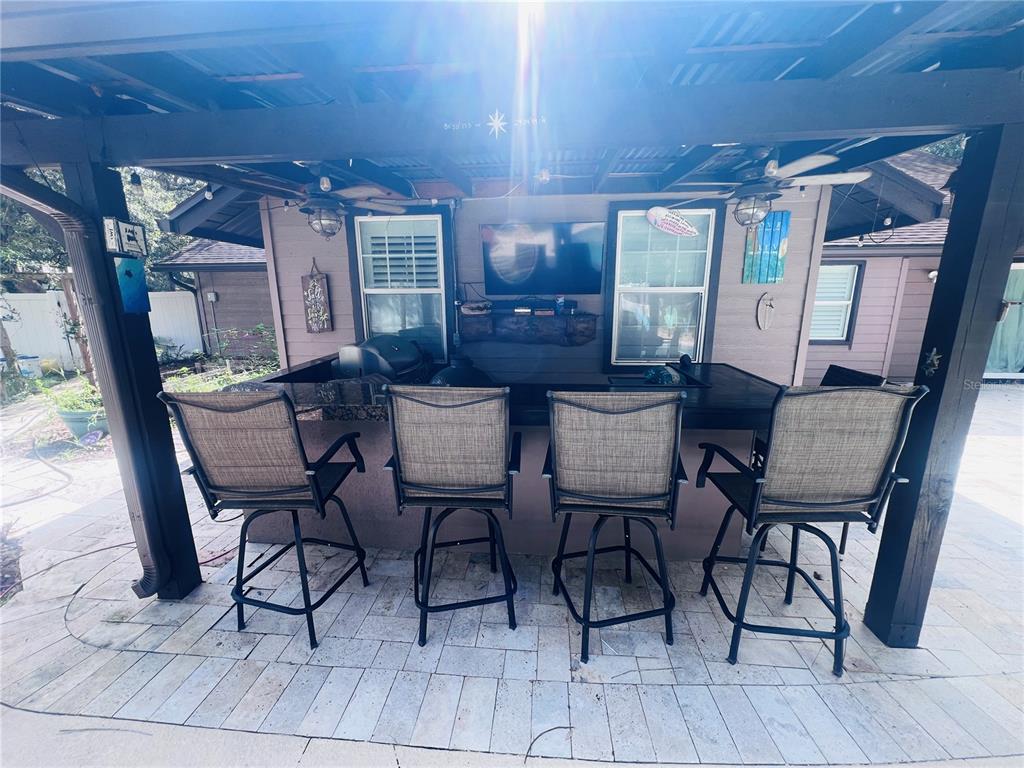 357 Tymber Run Ormond Beach, FL 32174 - Photo 27 of 32 a view of a dining room with furniture and wooden floor