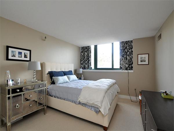 42 8th Street, Unit 5308 Boston, MA 02129 - Photo 4 of 12 a bedroom with a bed and window