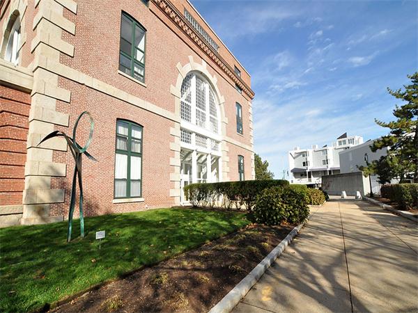 42 8th Street, Unit 5308 Boston, MA 02129 - Photo 7 of 12 a view of a building with a yard