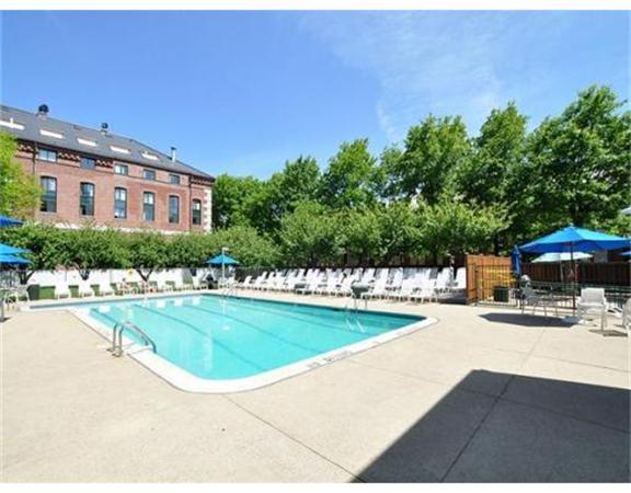 42 8th Street, Unit 5308 Boston, MA 02129 - Photo 8 of 12 a view of a swimming pool with an outdoor seating