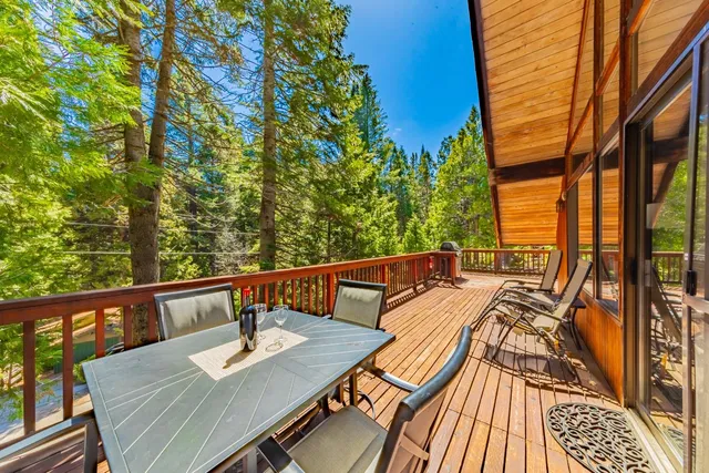 a view of sitting area with furniture and wooden deck
