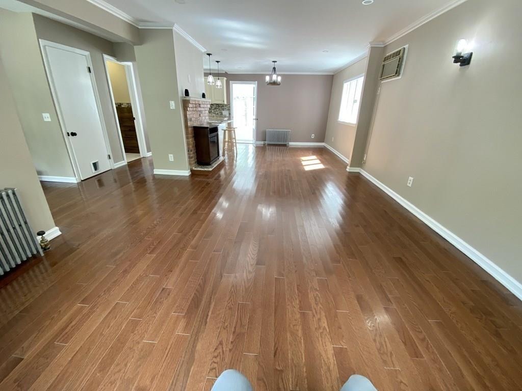458 Gleasondale Road Stow, MA 01775 - Photo 5 of 14 a view of a livingroom with wooden floor