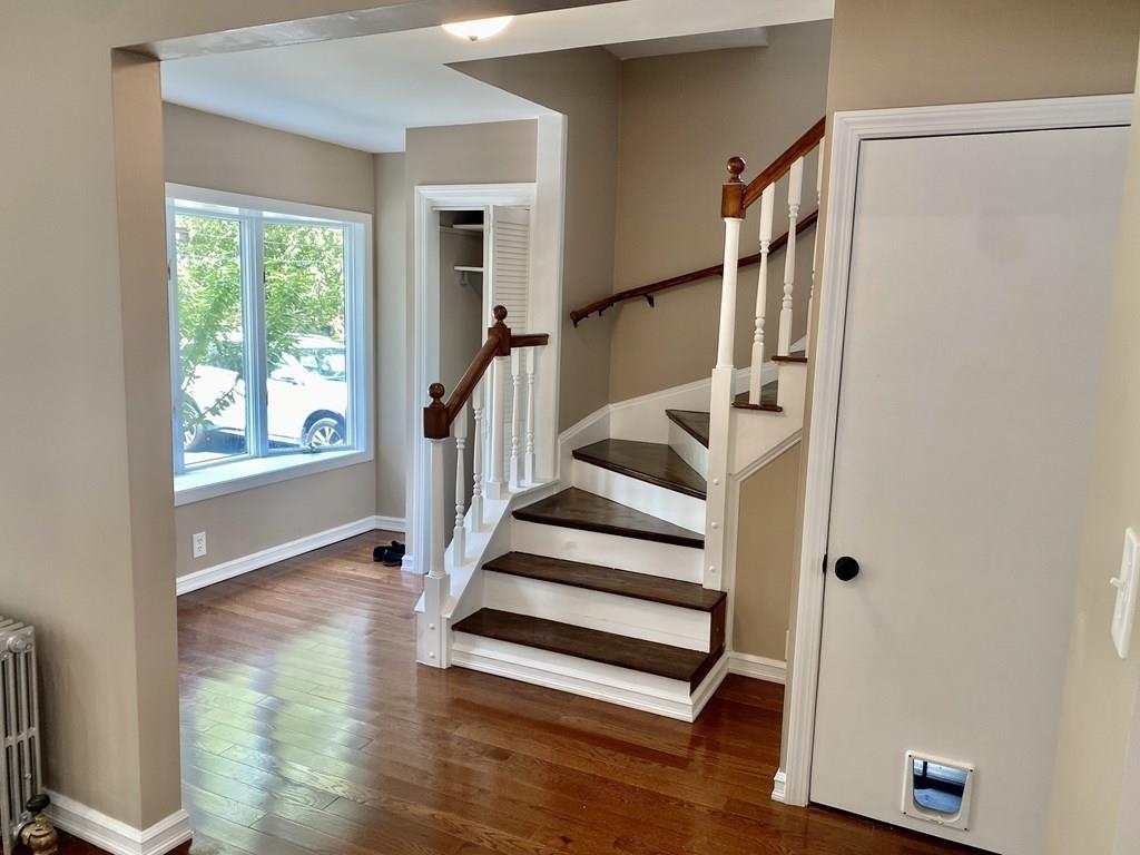 458 Gleasondale Road Stow, MA 01775 - Photo 8 of 14 a view of entryway with wooden floor and front door