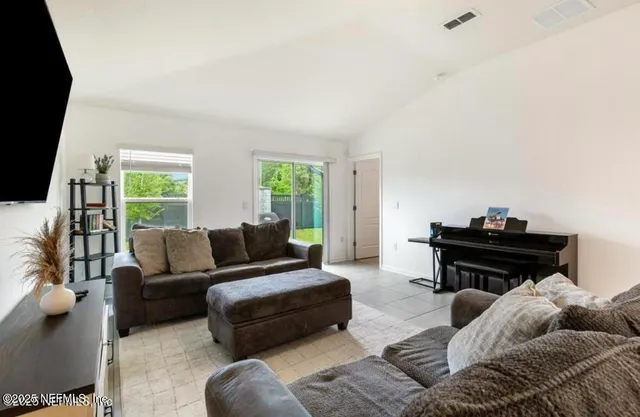 a bed room with a bed and a couch