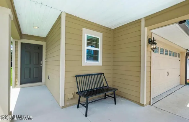 a view of entryway with wooden floor