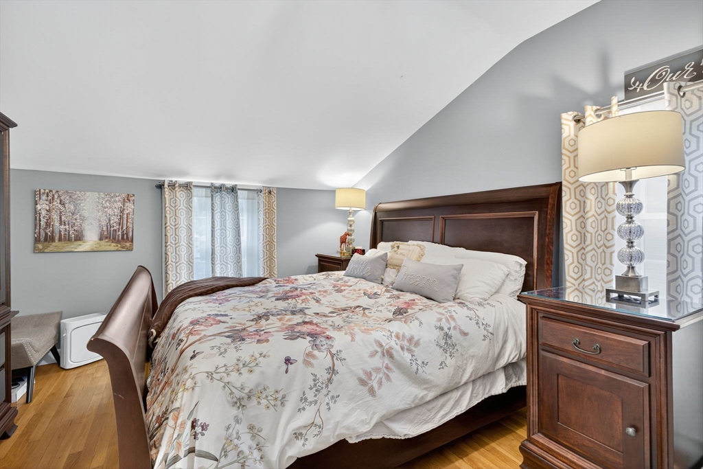 14 Ferndale Road Natick, MA 01760 - Photo 23 of 33 a bedroom with a bed and wooden floor