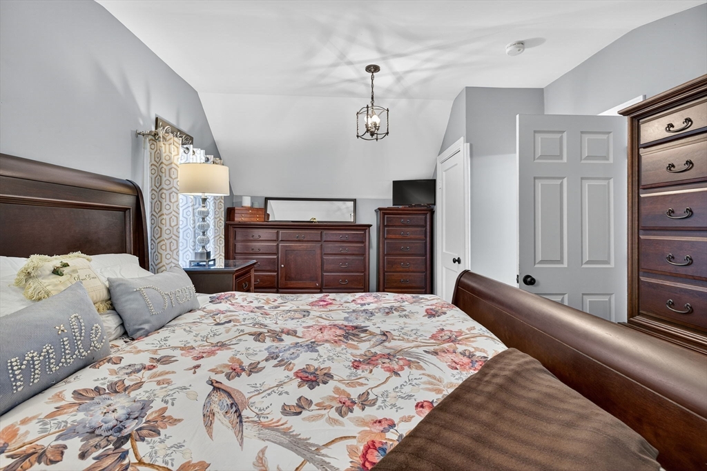 14 Ferndale Road Natick, MA 01760 - Photo 24 of 33 a bedroom with a large bed and dresser
