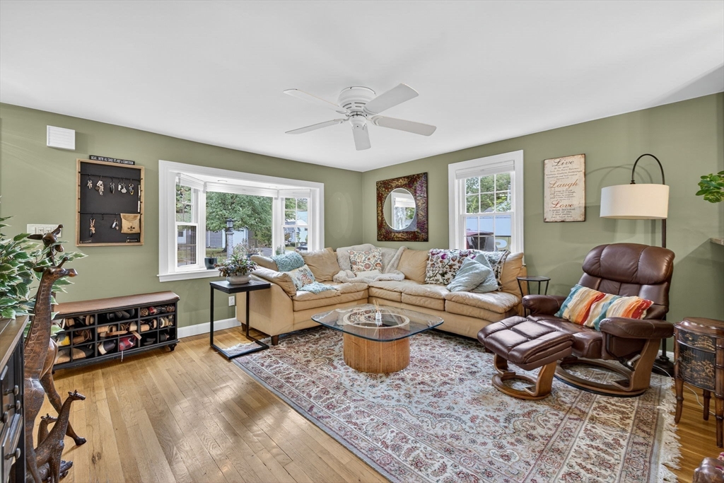 14 Ferndale Road Natick, MA 01760 - Photo 8 of 33 a living room with furniture and wooden floor