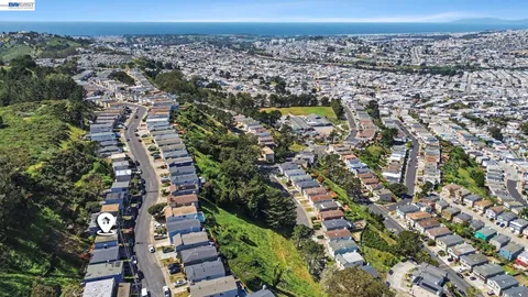 an aerial view of residential building with outdoor space