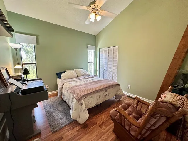 a backyard of a house with lots of green space