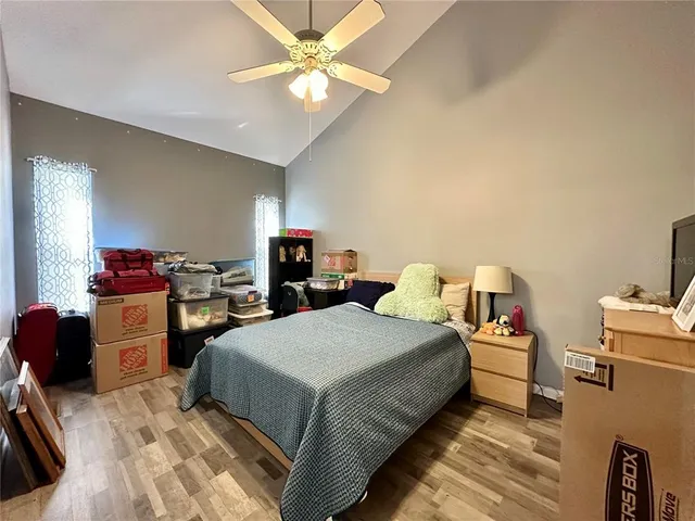 a view of a room with gym equipment and a large window