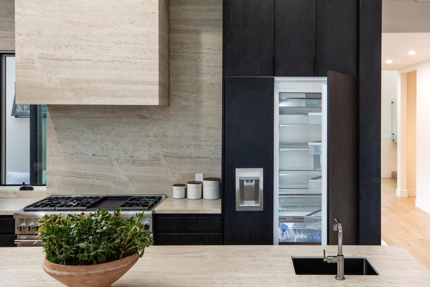 3413 Ross Road Palo Alto, CA 94303 - Photo 17 of 45 a front view of a house with a garden