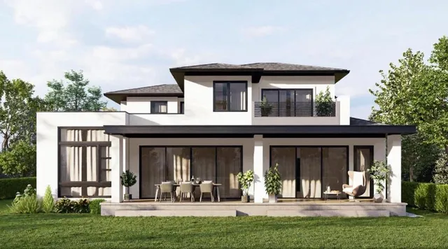 front view of a brick house with a yard