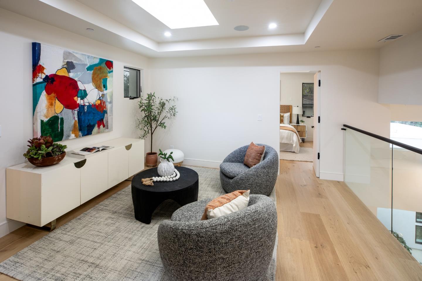 3413 Ross Road Palo Alto, CA 94303 - Photo 24 of 45 a living room with furniture and flowers