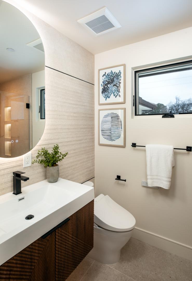 3413 Ross Road Palo Alto, CA 94303 - Photo 34 of 45 a bathroom with a sink mirror and toilet