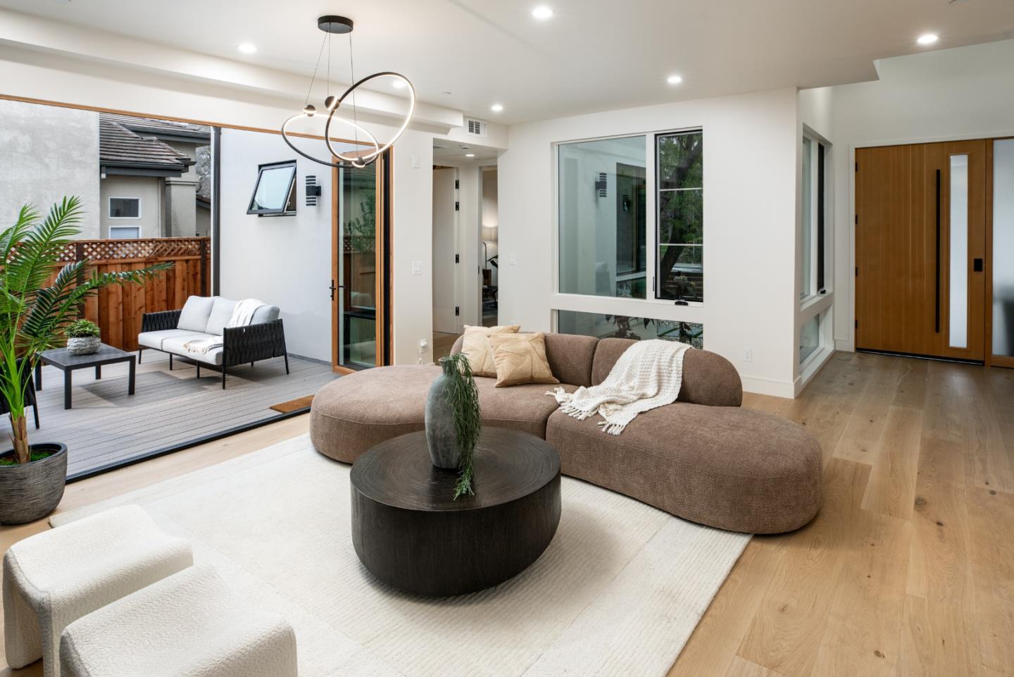 3413 Ross Road Palo Alto, CA 94303 - Photo 7 of 45 a living room with furniture and a large window