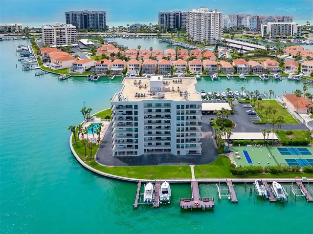 a view of yard with swimming pool and green space