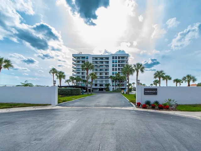 a view of a building with a garden