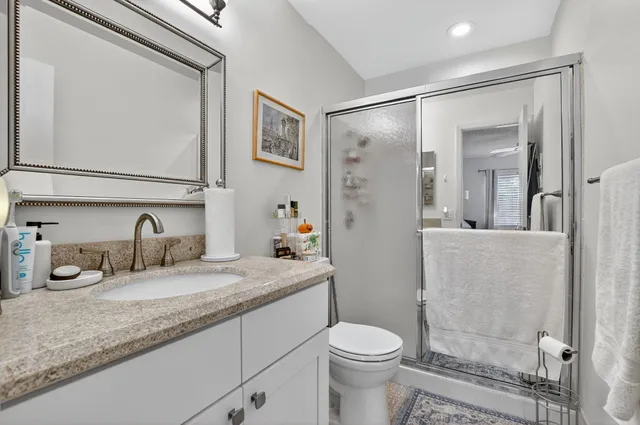 a view of a big room with chairs and a table