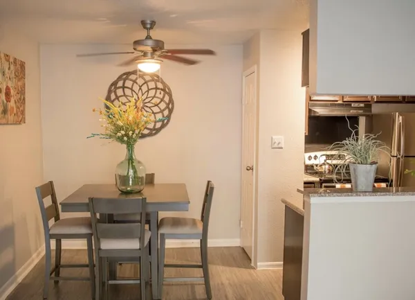 a view of a dining room with furniture