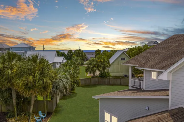 a kitchen with a table and chairs in it