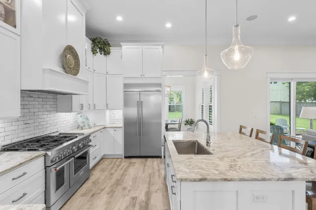 a bathroom with a sink and a shower