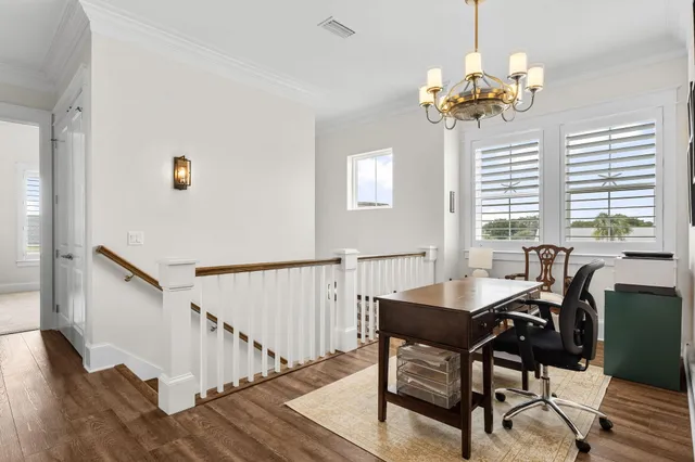 an aerial view of a house with a garden