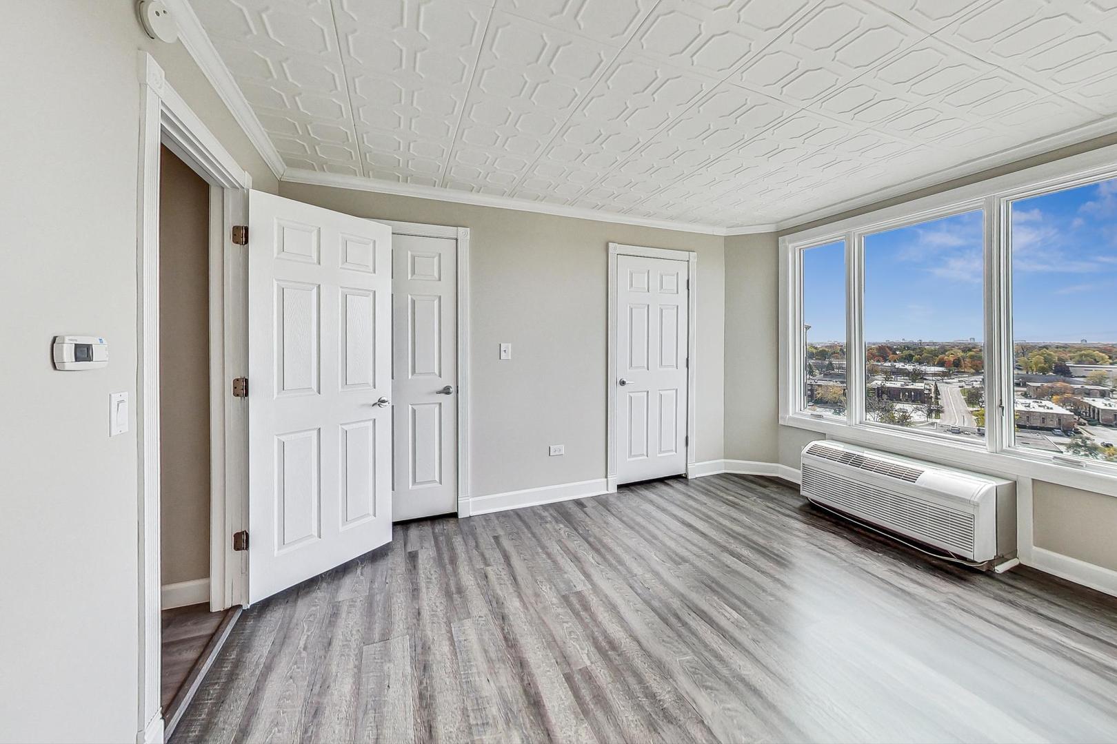 1 Renaissance Place, Unit 1220 Palatine, IL 60067 - Photo 9 of 9 a view of a room with wooden floor and window