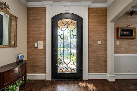 a view of entryway with wooden floor