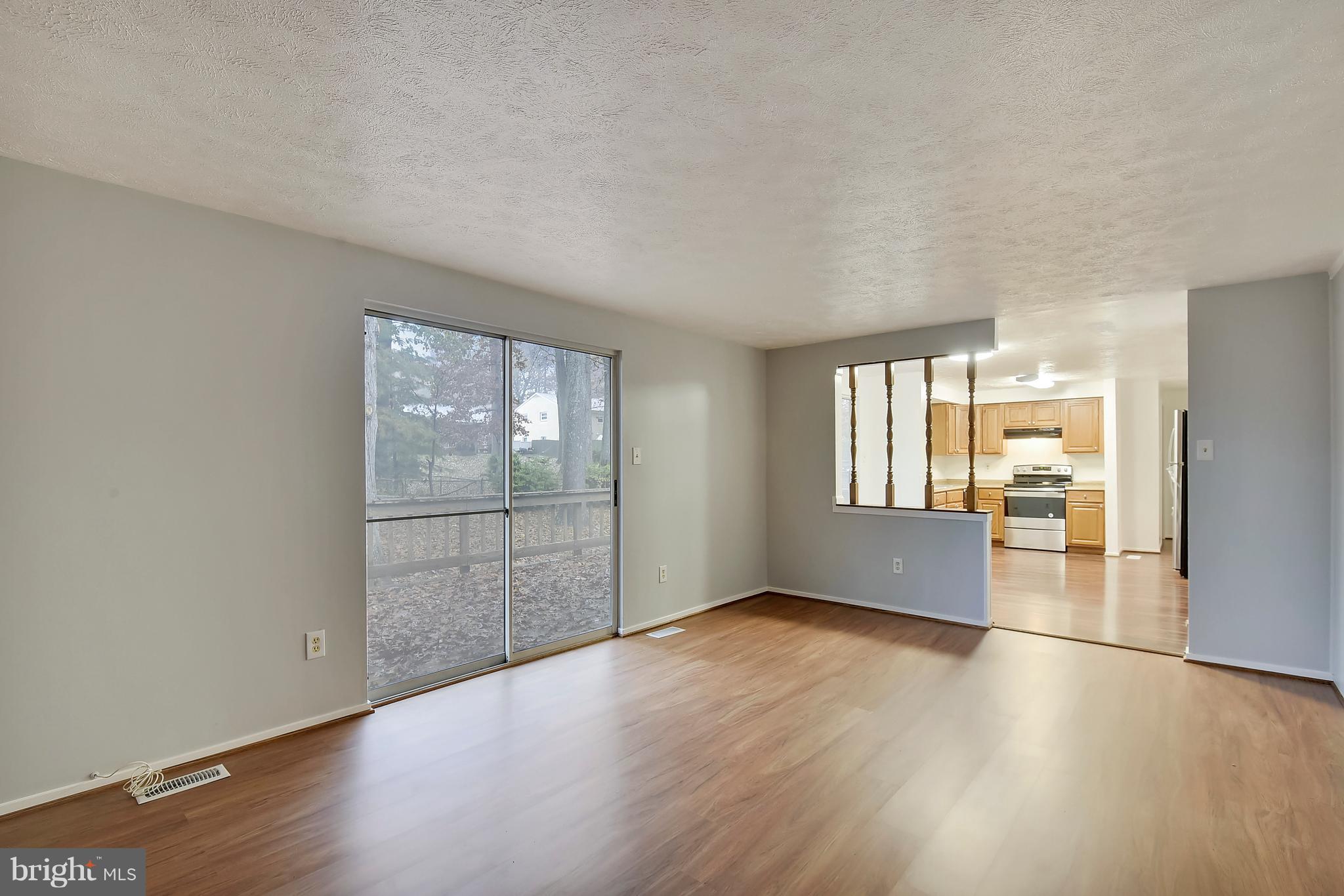 5729 Heming Avenue Springfield, VA 22151 - Photo 15 of 49 Family room with sliding glass doors to the deck