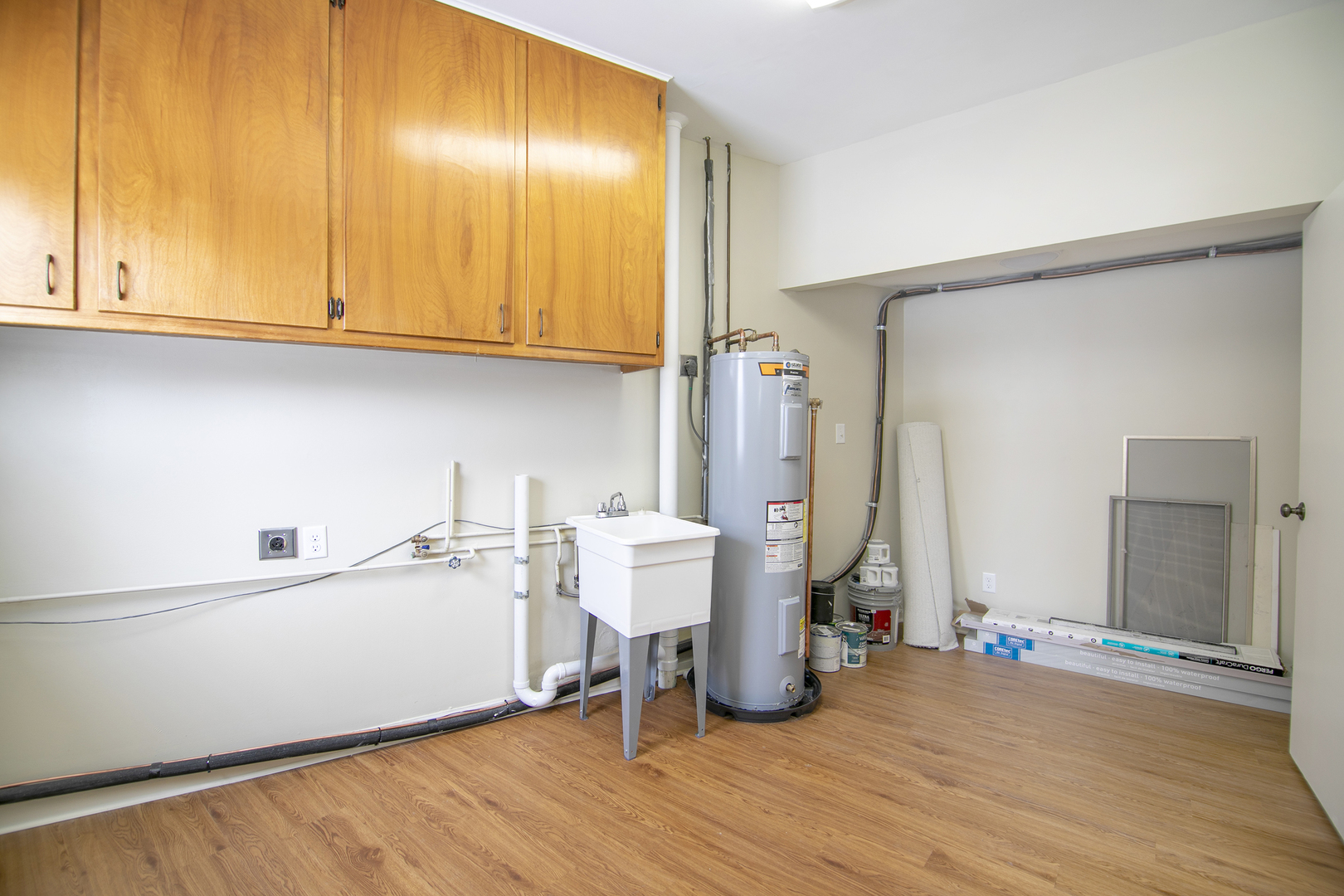 101 Sun Street, Unit A Cabery, IL 60919 - Photo 12 of 26 a view of an empty room with wooden floor and a window