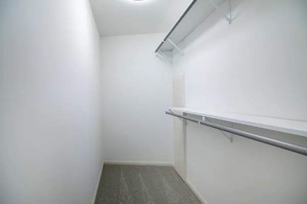 a view of a room with racks on the wall